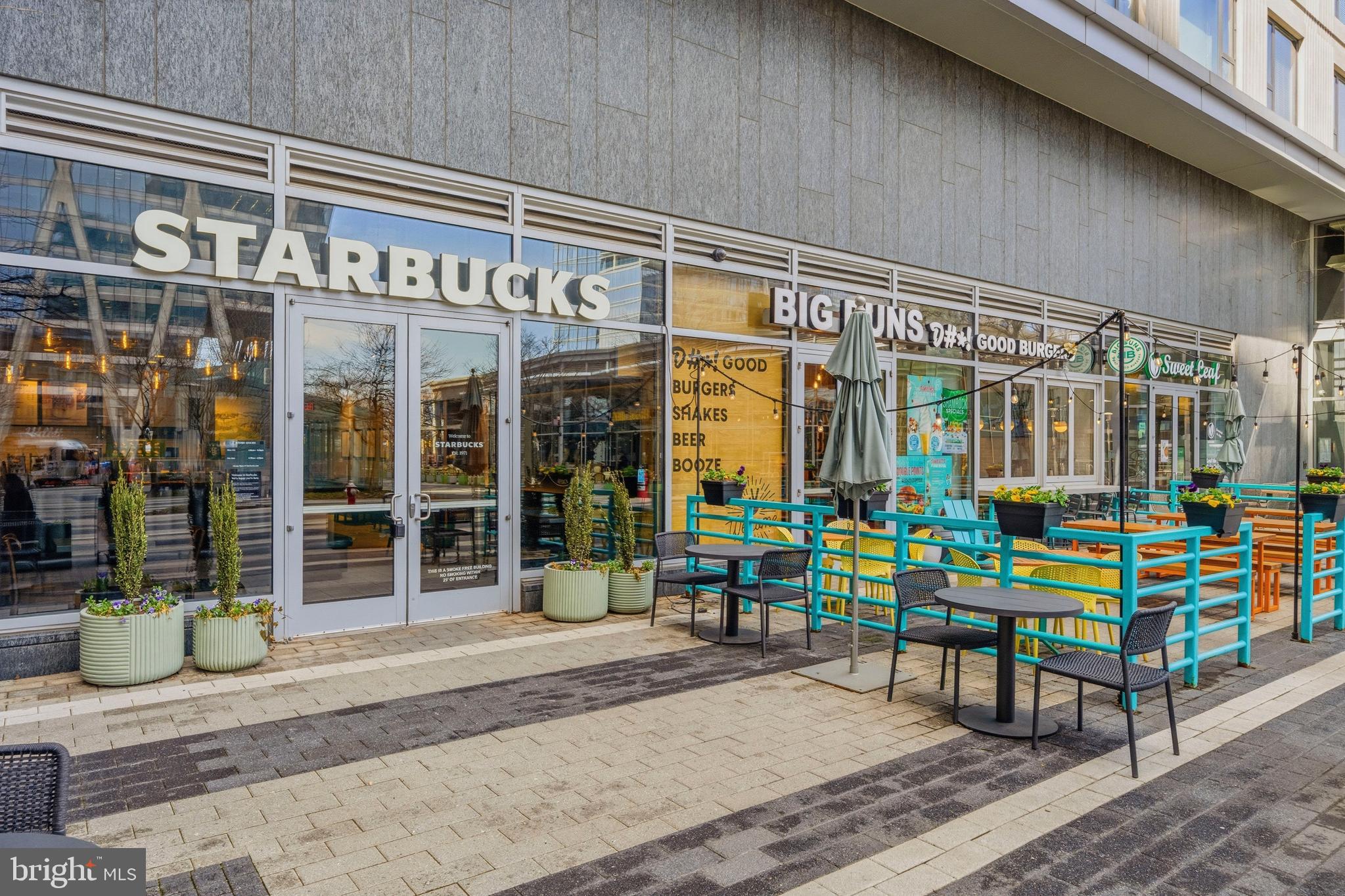 1878 Easterly Road Reston, VA 20190 - Photo 55 of 63 a front view of a building with outdoor seating area