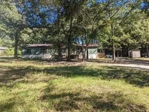 a view of swimming pool with a garden