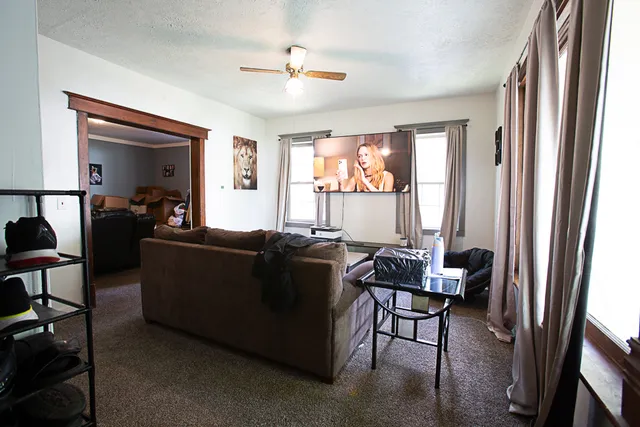 a living room with furniture and a window