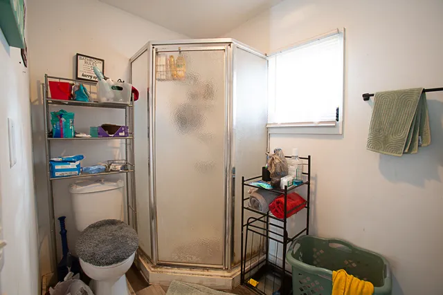 a bedroom with furniture and a bed