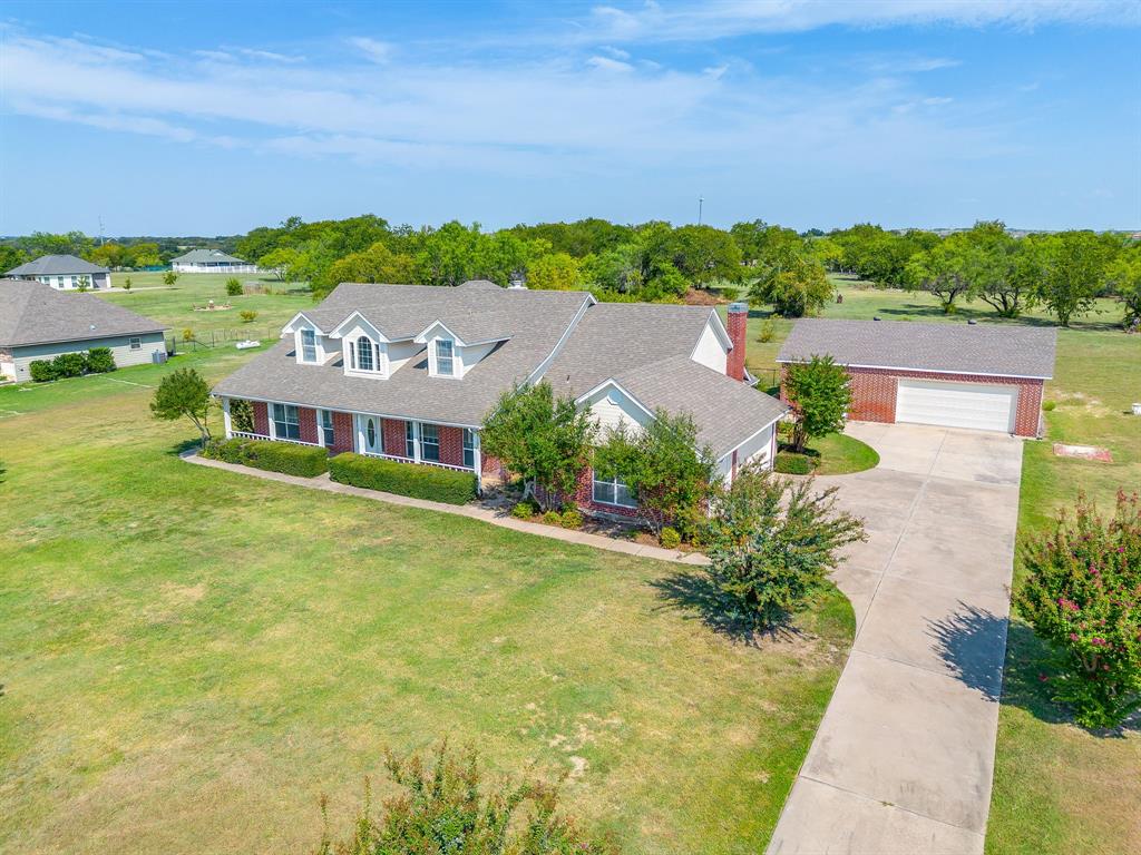125 View Point Court Aledo, TX 76008 - Photo 2 of 34 an aerial view of a house with a garden