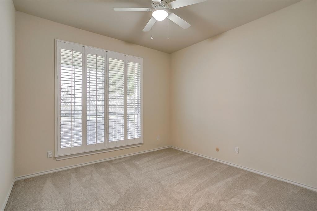 125 View Point Court Aledo, TX 76008 - Photo 21 of 34 an empty room with a window and a fan