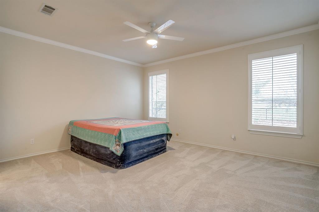 125 View Point Court Aledo, TX 76008 - Photo 25 of 34 a room with a bed and a window