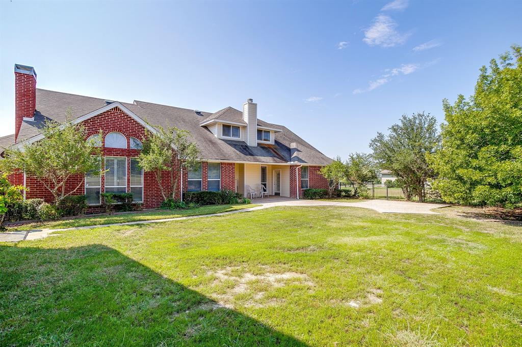 125 View Point Court Aledo, TX 76008 - Photo 28 of 34 a front view of house with outdoor space and swimming pool
