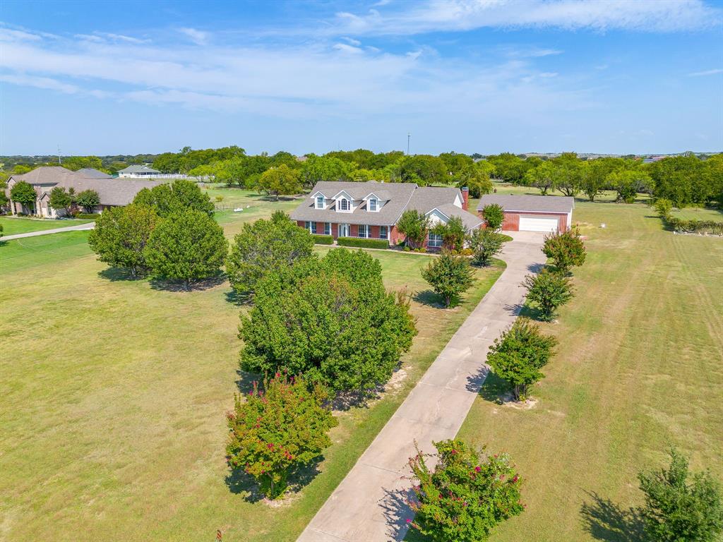 125 View Point Court Aledo, TX 76008 - Photo 3 of 34 a view of a lake with houses in the back