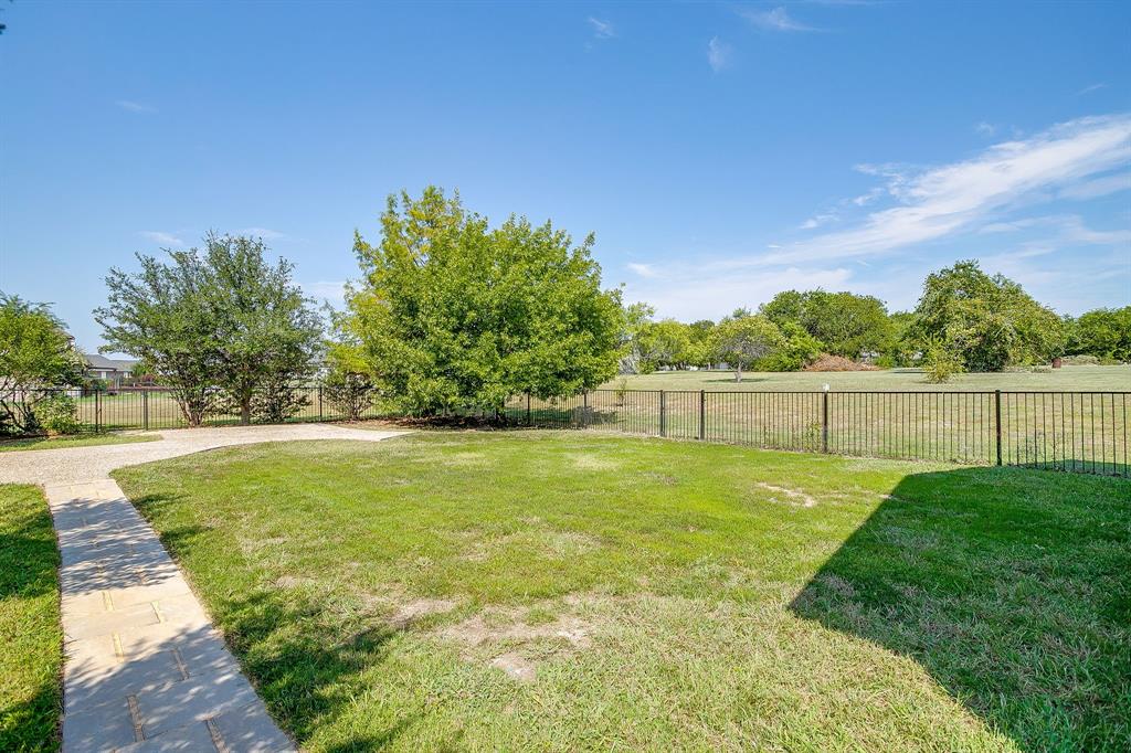 125 View Point Court Aledo, TX 76008 - Photo 33 of 34 a view of yard with swimming pool and green space