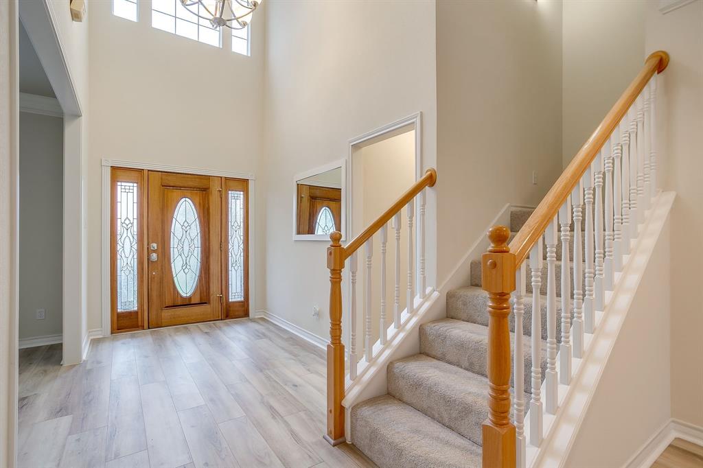 125 View Point Court Aledo, TX 76008 - Photo 7 of 34 a view of an entryway with wooden floor and door