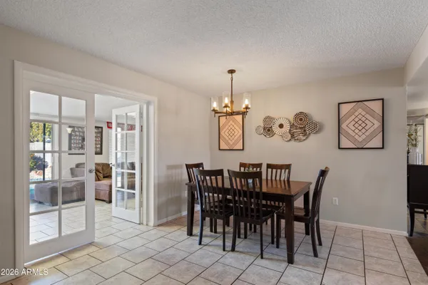 a view of a dining room with furniture