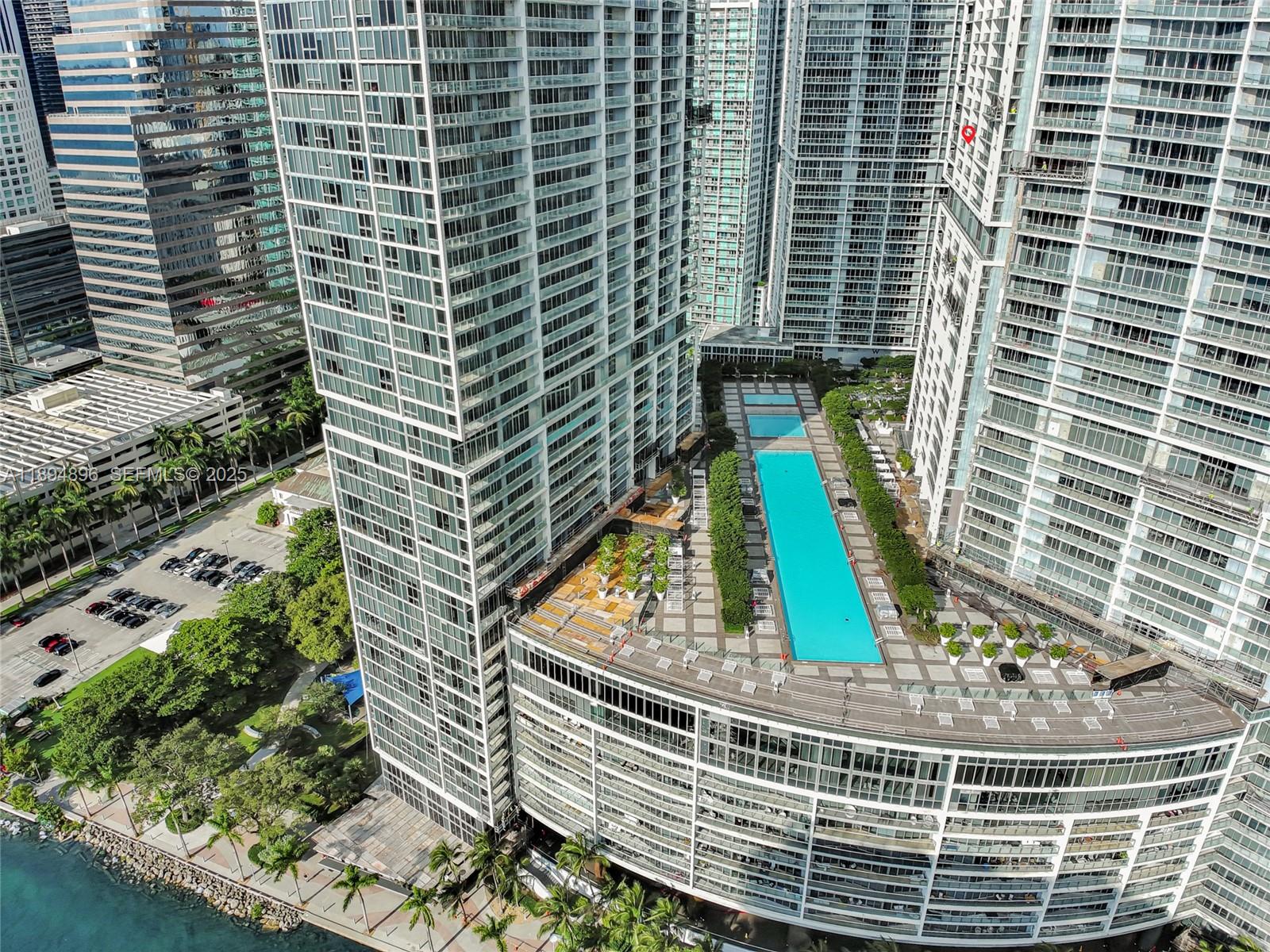 475 Brickell Avenue, Unit 3111 Miami, FL 33131 - Photo 18 of 24 a view of a balcony with a potted plant