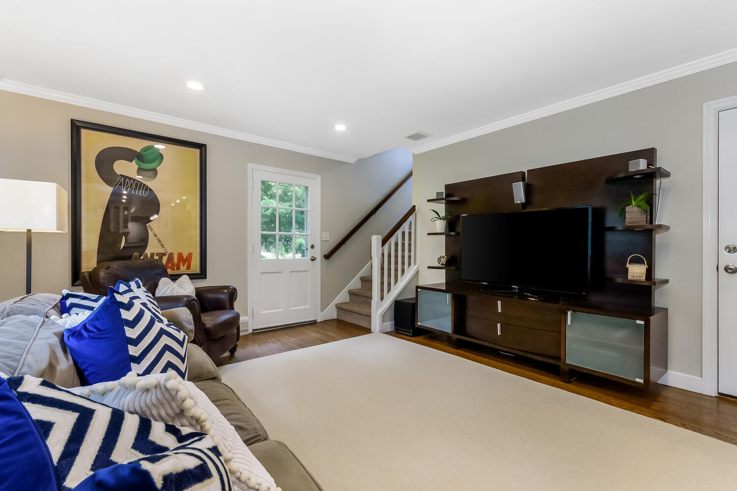21 Middlesex Road Darien, CT 06820 - Photo 12 of 40 a living room with furniture and a flat screen tv