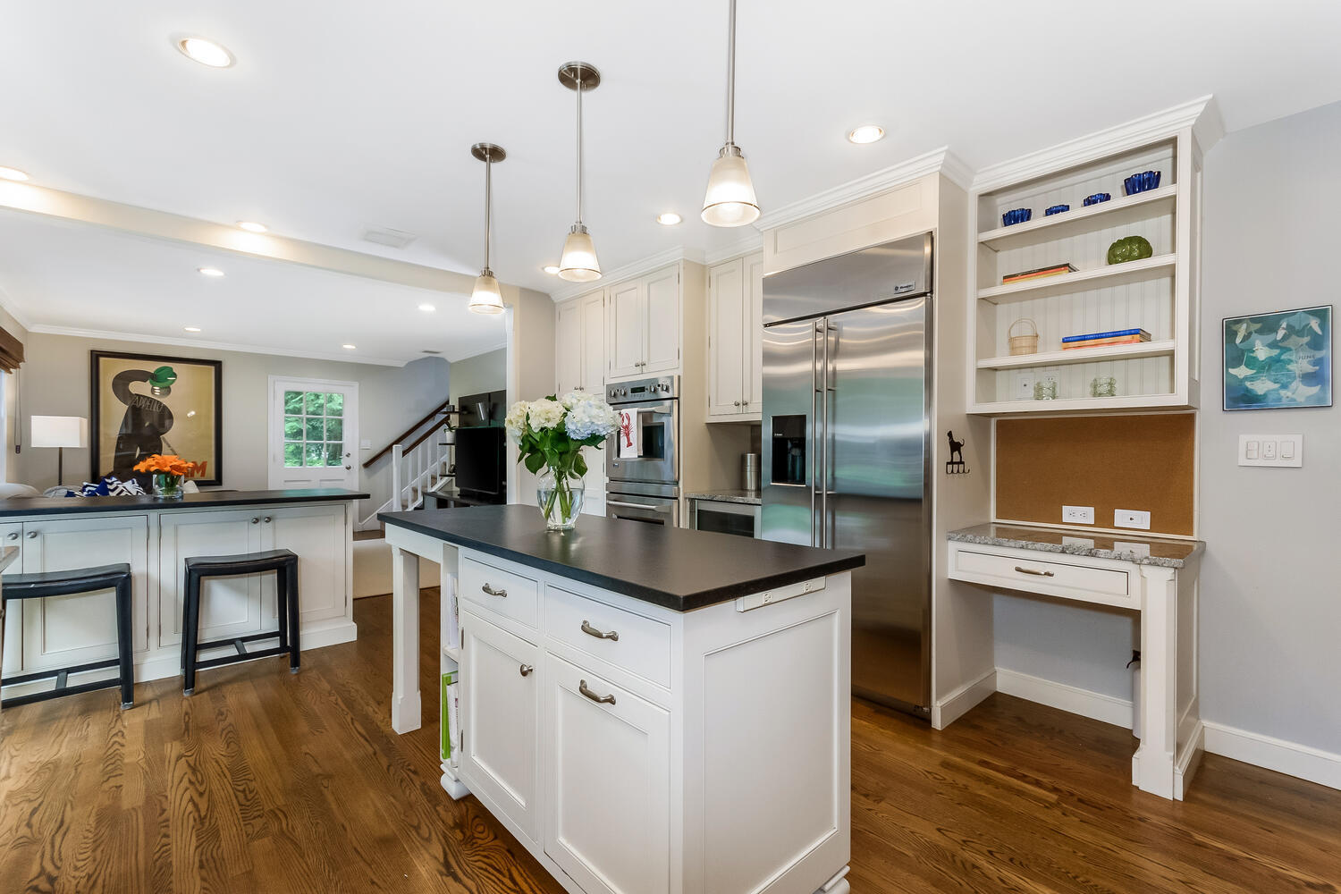 21 Middlesex Road Darien, CT 06820 - Photo 15 of 40 a kitchen with stainless steel appliances kitchen island granite countertop a stove a sink and a refrigerator