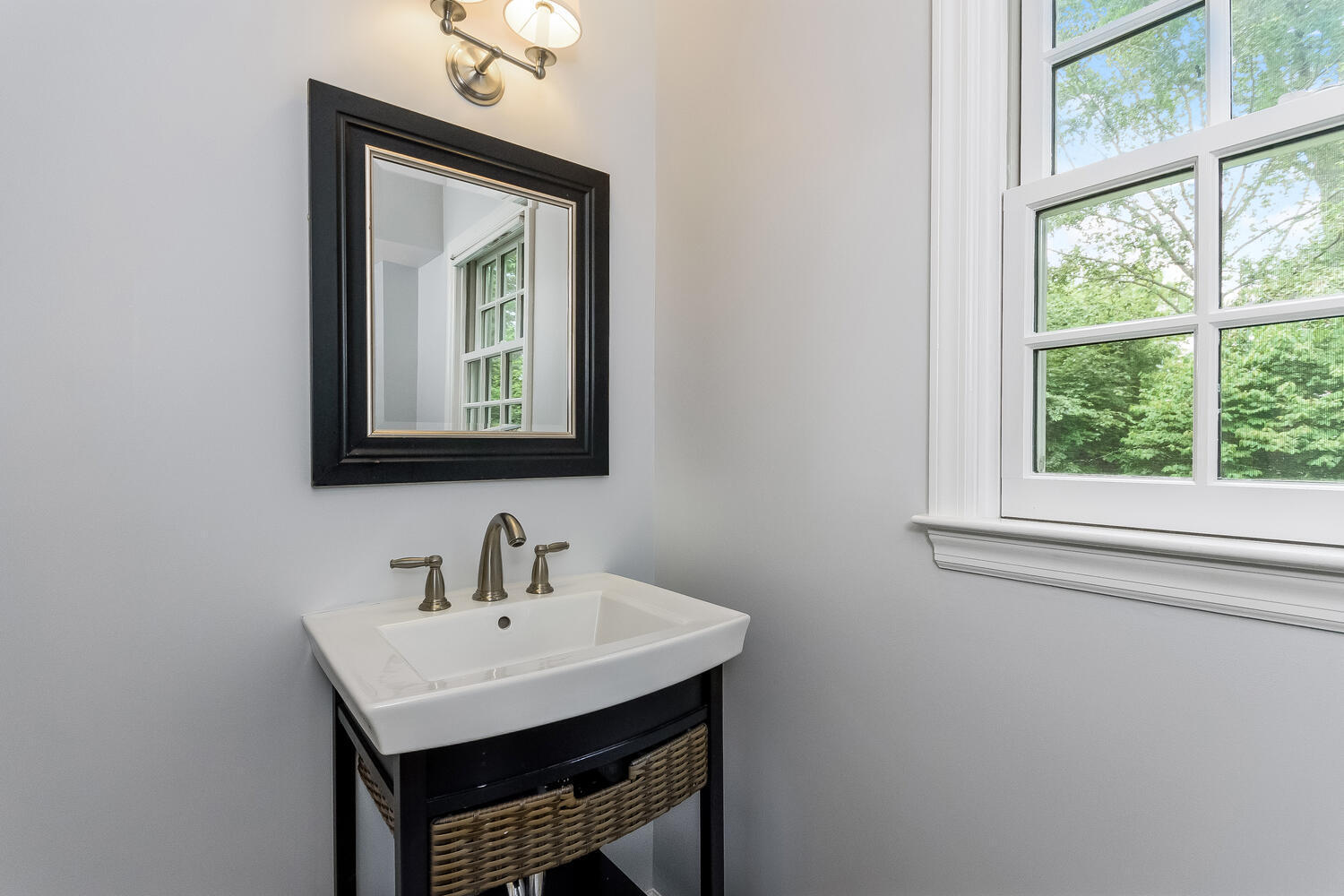 21 Middlesex Road Darien, CT 06820 - Photo 19 of 40 a bathroom with a sink a vanity and a mirror