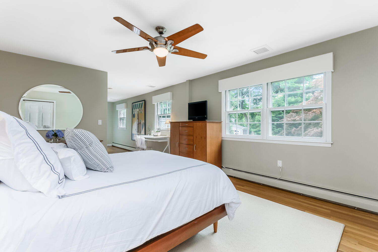 21 Middlesex Road Darien, CT 06820 - Photo 22 of 40 a bedroom with a large bed and a large window