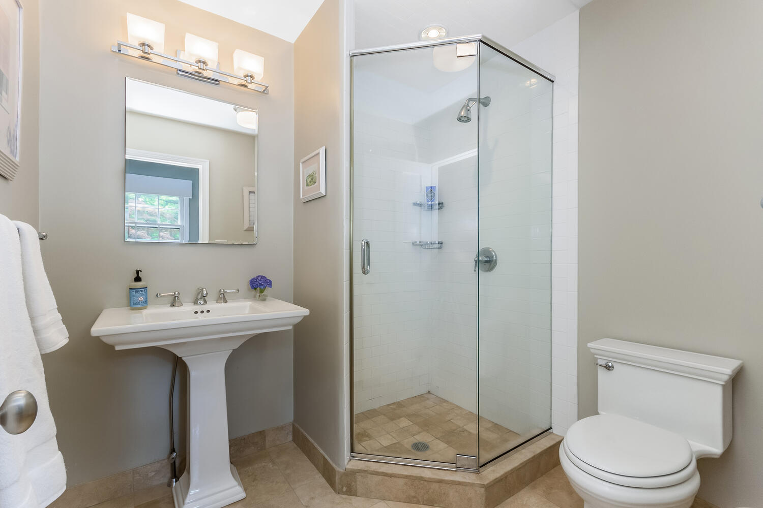 21 Middlesex Road Darien, CT 06820 - Photo 24 of 40 a bathroom with a sink mirror toilet and shower