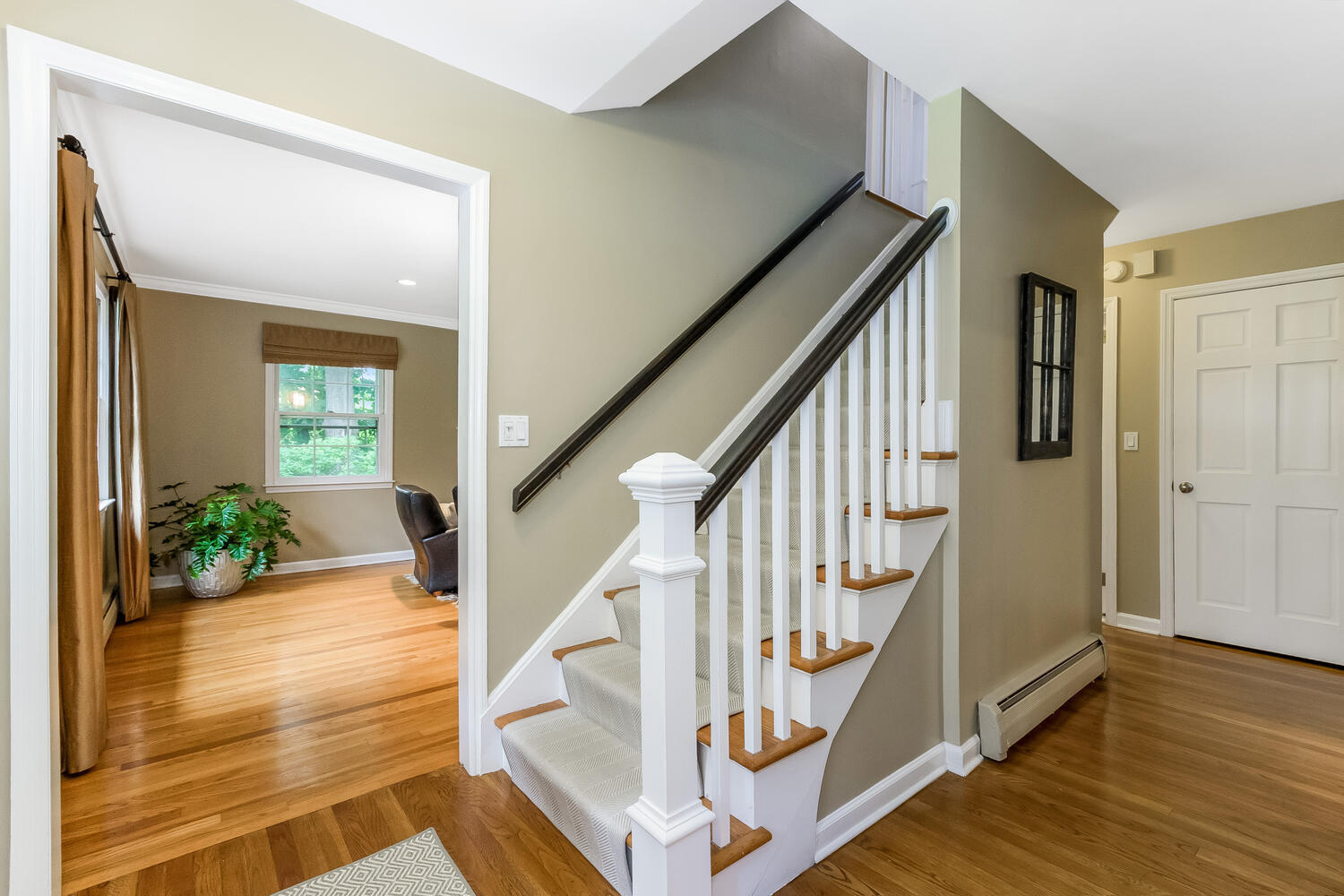 21 Middlesex Road Darien, CT 06820 - Photo 5 of 40 a view of entryway with wooden floor and stairs