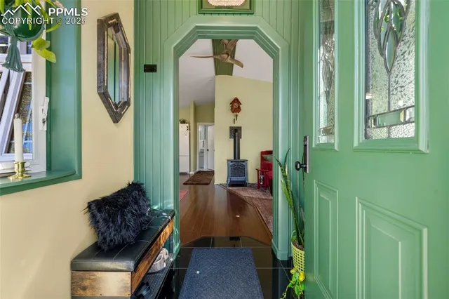a view of a hallway with a glass door