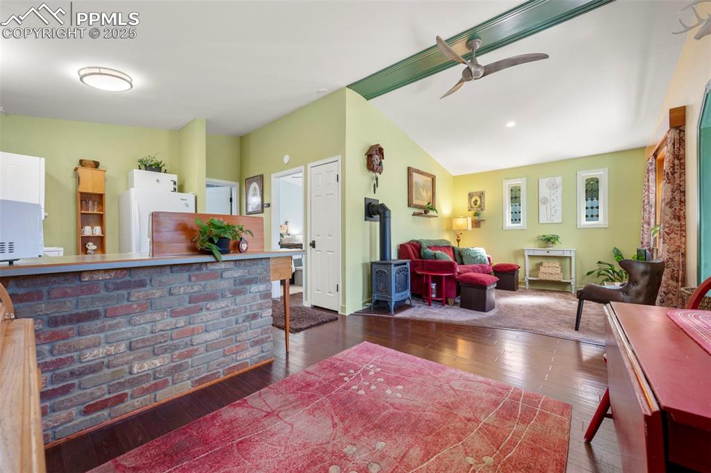 183 Beaver Pond Road Divide, CO 80814 - Photo 10 of 28 a living room with furniture and a large mirror