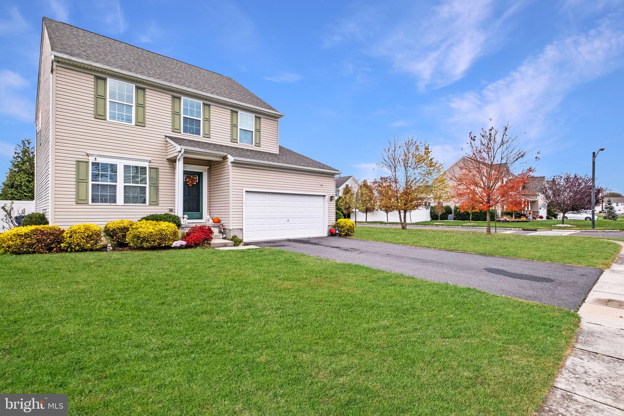 19 Vaughn Way Burlington, NJ 08016 - Photo 2 of 43 a front view of house with yard and green space