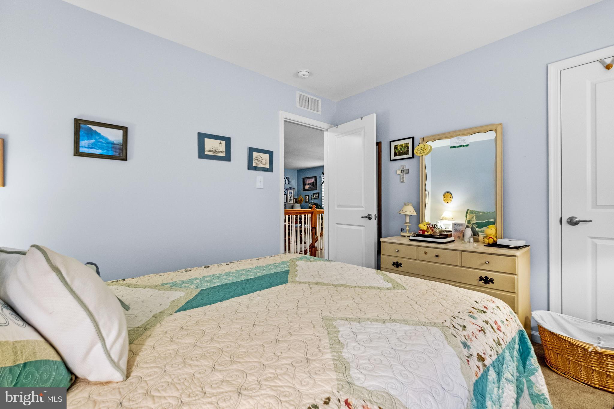 19 Vaughn Way Burlington, NJ 08016 - Photo 28 of 43 a bedroom with a bed and a dresser