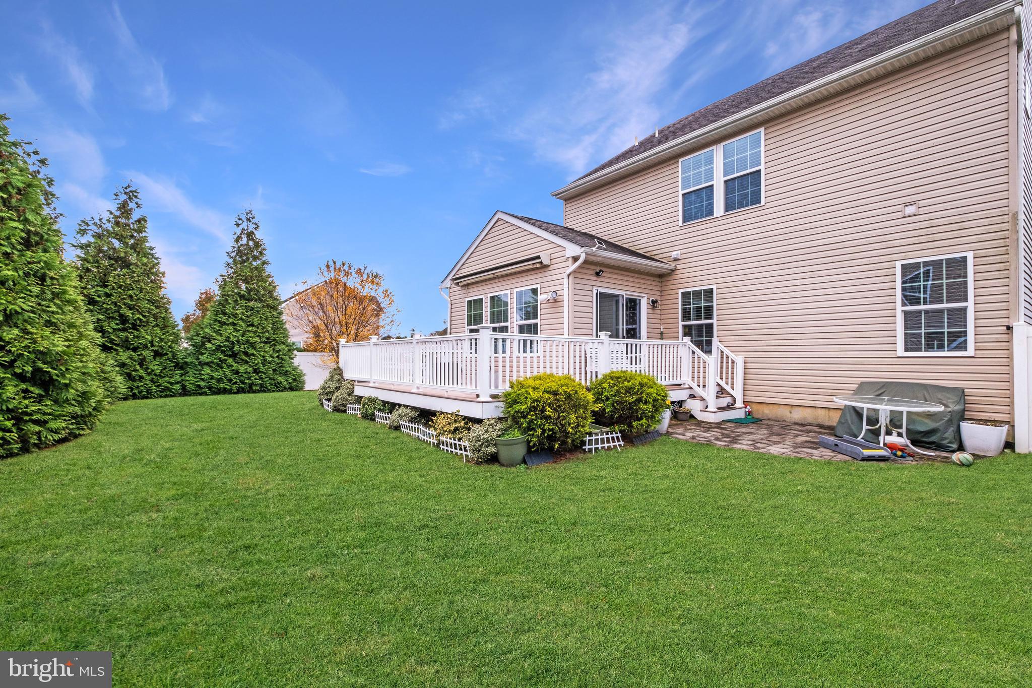 19 Vaughn Way Burlington, NJ 08016 - Photo 40 of 43 a front view of a house with a garden and yard