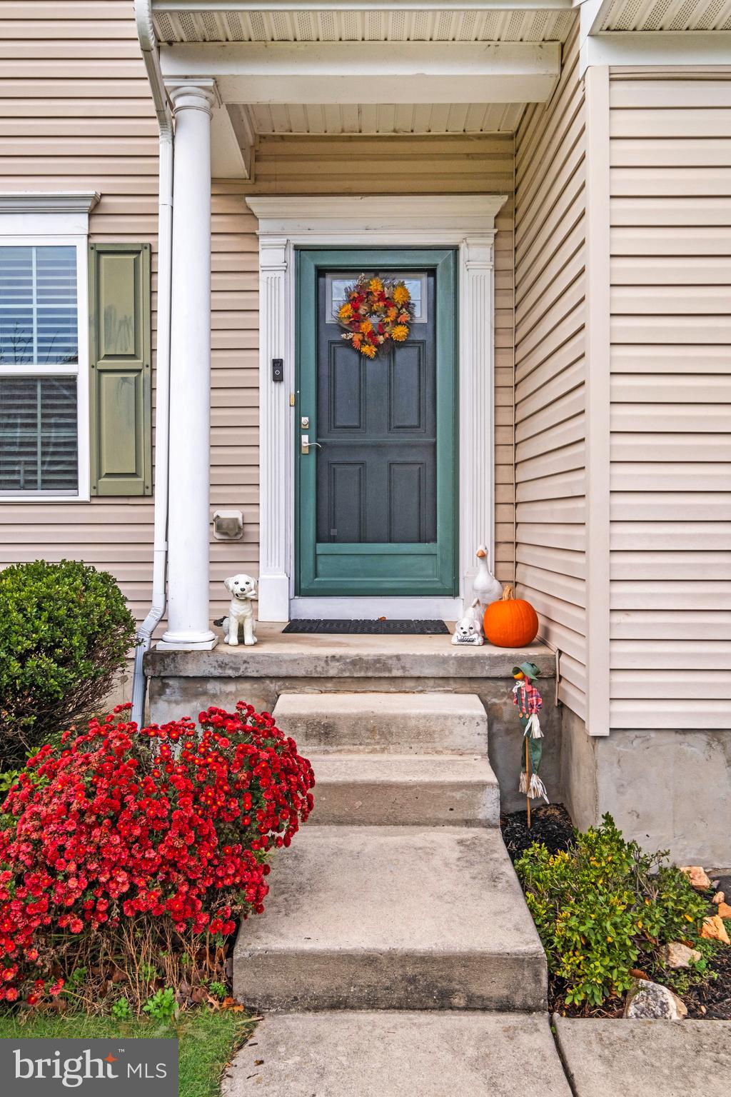 19 Vaughn Way Burlington, NJ 08016 - Photo 4 of 43 a front view of a house with a garden