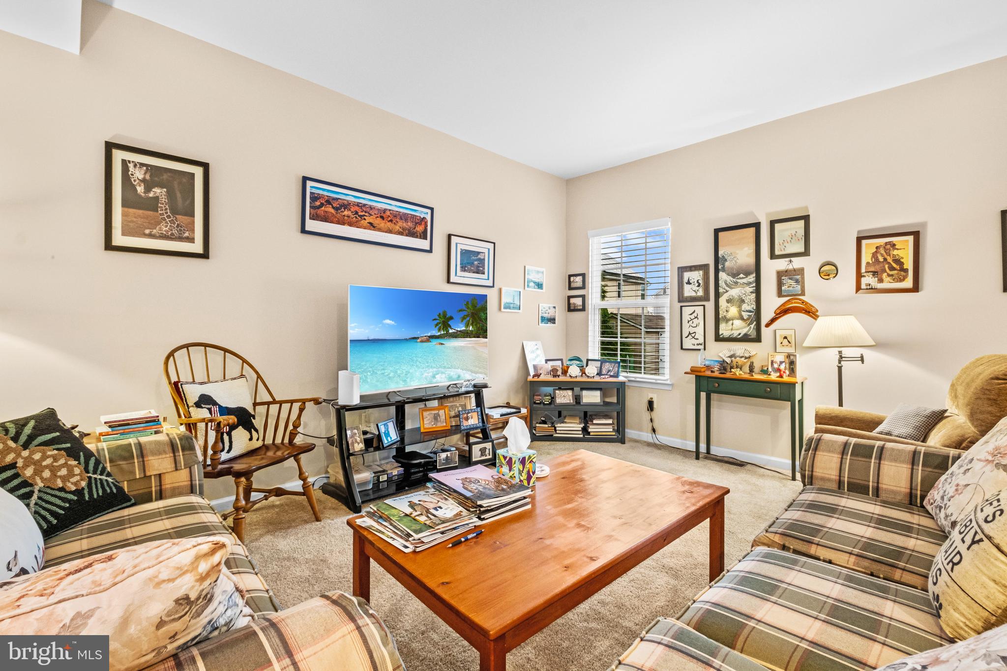 19 Vaughn Way Burlington, NJ 08016 - Photo 9 of 43 a living room with furniture and a floor to ceiling window