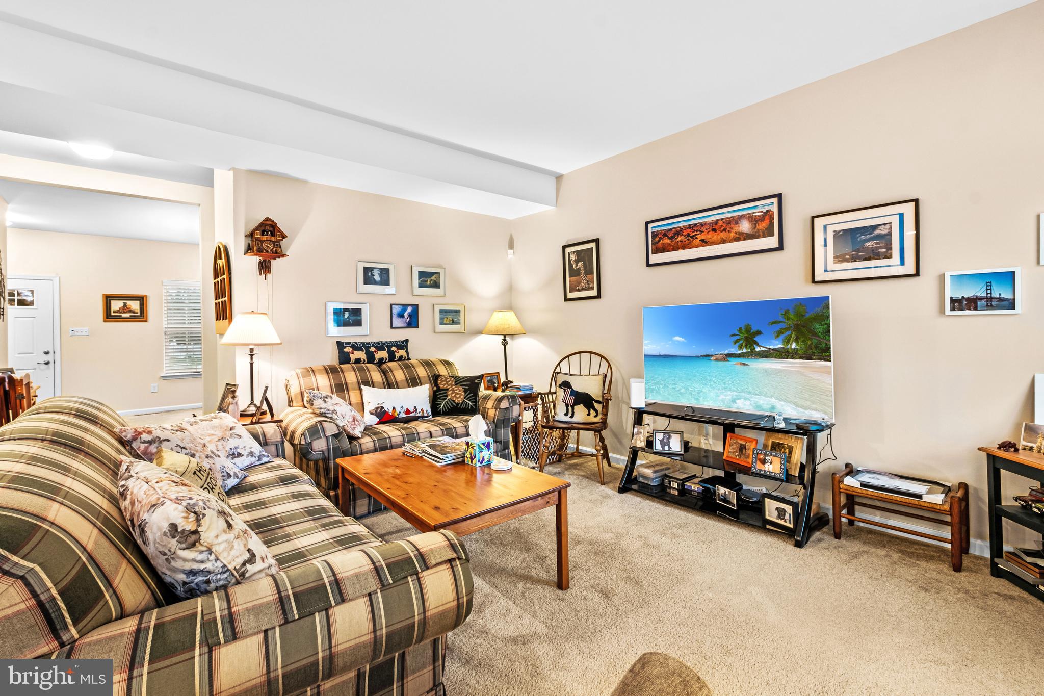 19 Vaughn Way Burlington, NJ 08016 - Photo 10 of 43 a living room with furniture and painting on the wall