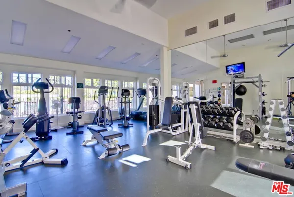 a view of a room with gym equipment