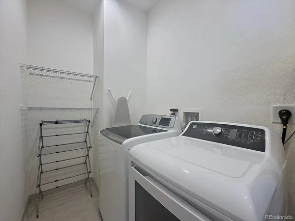 a utility room with dryer and washer
