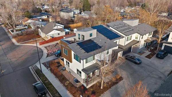 an aerial view of a yard with table and chairs