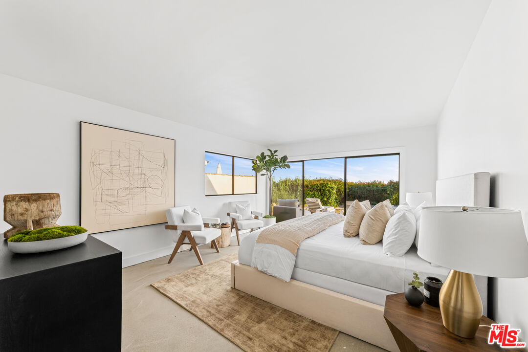 18440 Wakecrest Drive Malibu, CA 90265 - Photo 15 of 29 a living room with furniture and a large window