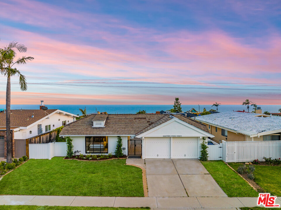18440 Wakecrest Drive Malibu, CA 90265 - Photo 27 of 29 a view of house with yard and ocean view