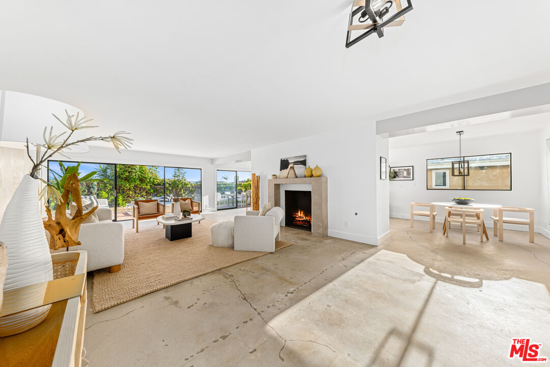 18440 Wakecrest Drive Malibu, CA 90265 - Photo 4 of 29 a living room with furniture and a table