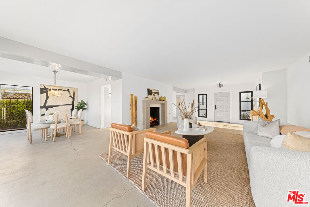18440 Wakecrest Drive Malibu, CA 90265 - Photo 8 of 29 a living room with furniture and a wooden floor