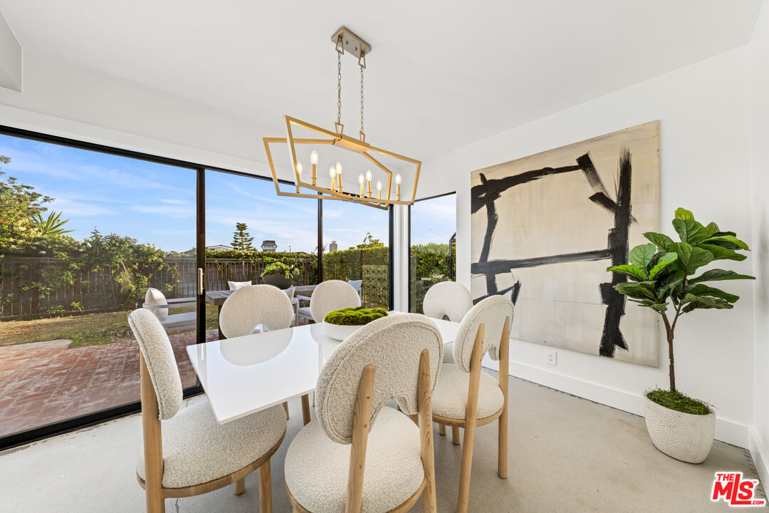 18440 Wakecrest Drive Malibu, CA 90265 - Photo 10 of 29 a view of a dining room with furniture window and outside view