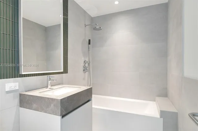 a kitchen with a sink and a large window