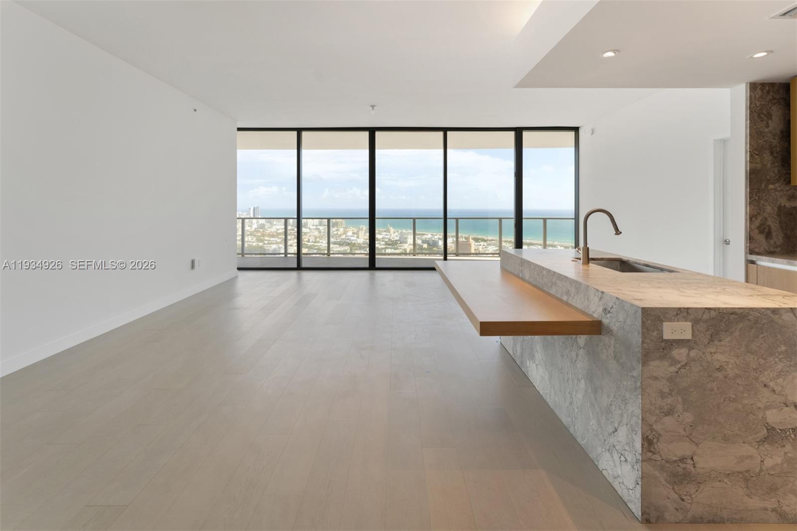 500 Alton Road, Unit 3905 Miami Beach, FL 33139 - Photo 21 of 35 a view of a kitchen with a large window