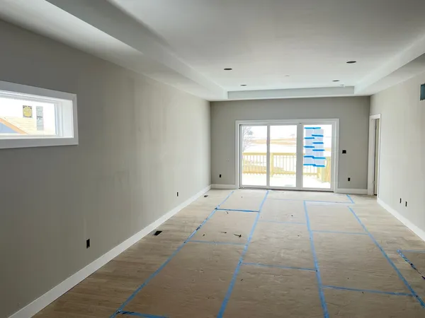 an empty room with windows