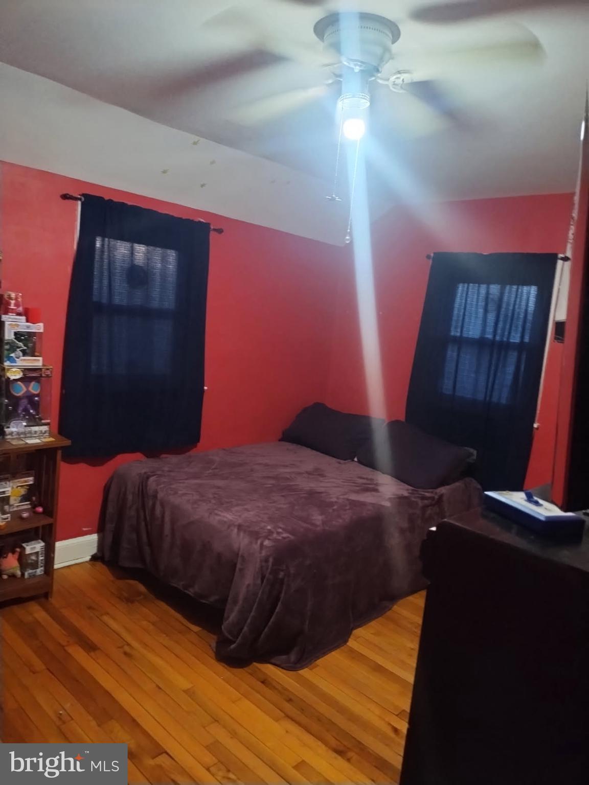 117 Stahl Avenue New Castle, DE 19720 - Photo 19 of 20 a bedroom with a bed and a mirror