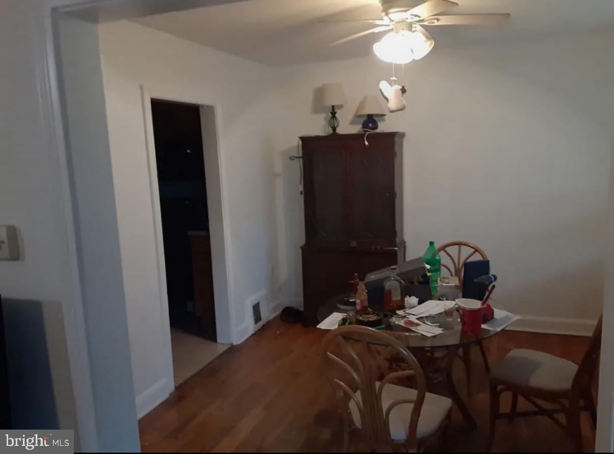 117 Stahl Avenue New Castle, DE 19720 - Photo 6 of 20 a bedroom with a bed and a chandelier