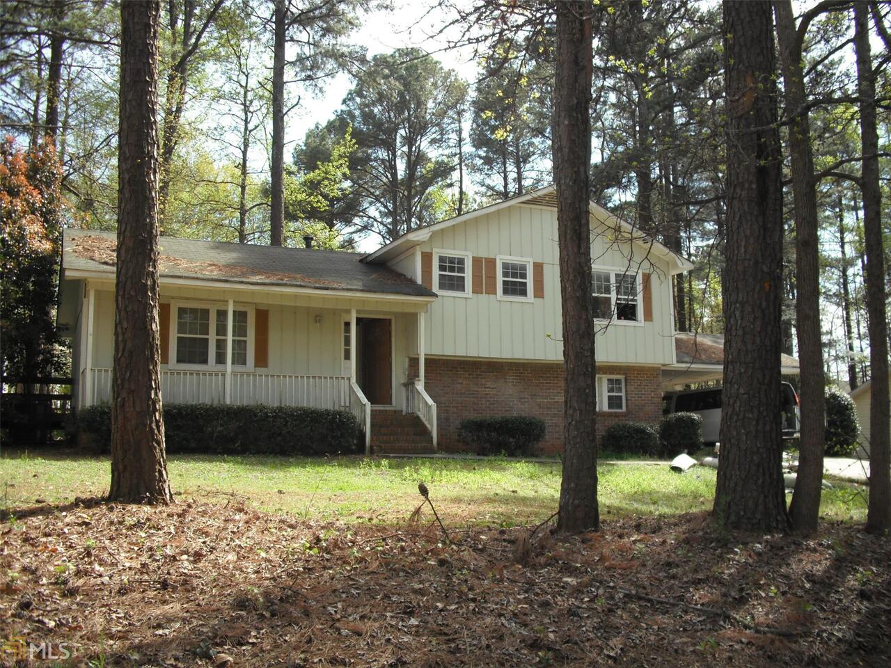 4333 Sterling Forest Drive, Unit 6 Decatur, GA 30034 - Photo 1 of 1 a view of a house with backyard and a tree