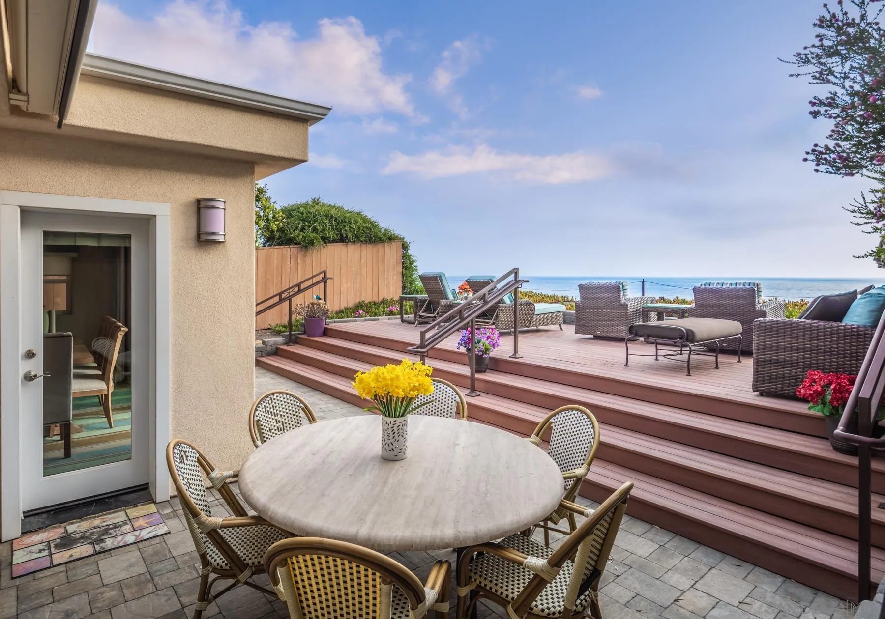 258 Neptune Avenue Encinitas, CA 92024 - Photo 11 of 26 a view of a swimming pool with a lounge chairs