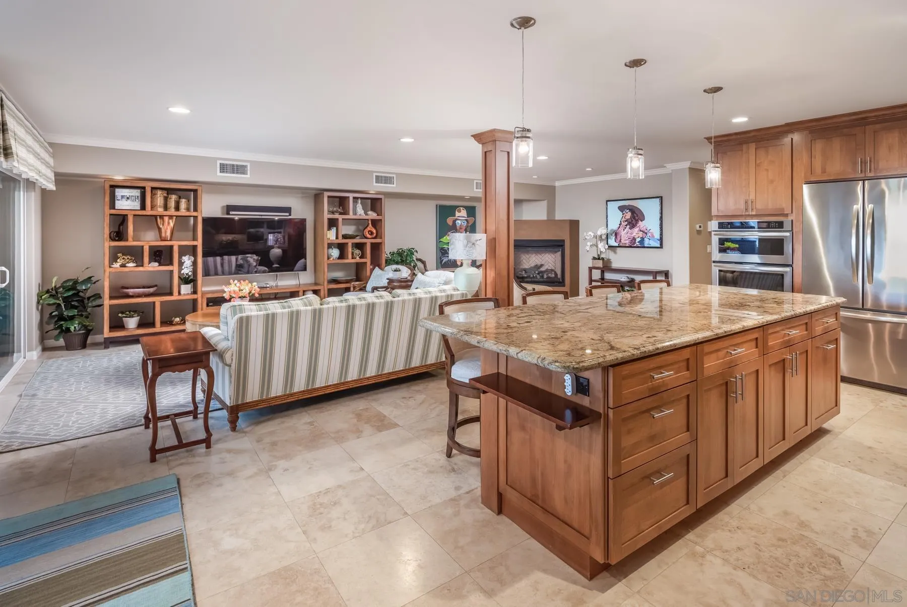 258 Neptune Avenue Encinitas, CA 92024 - Photo 14 of 26 a kitchen with stainless steel appliances granite countertop a stove and a refrigerator