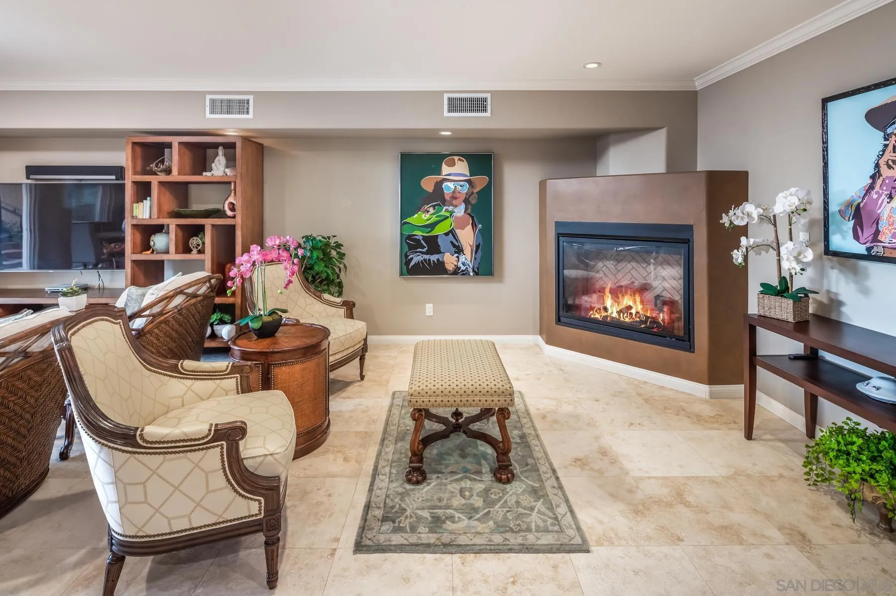 258 Neptune Avenue Encinitas, CA 92024 - Photo 15 of 26 a living room with furniture and a fireplace