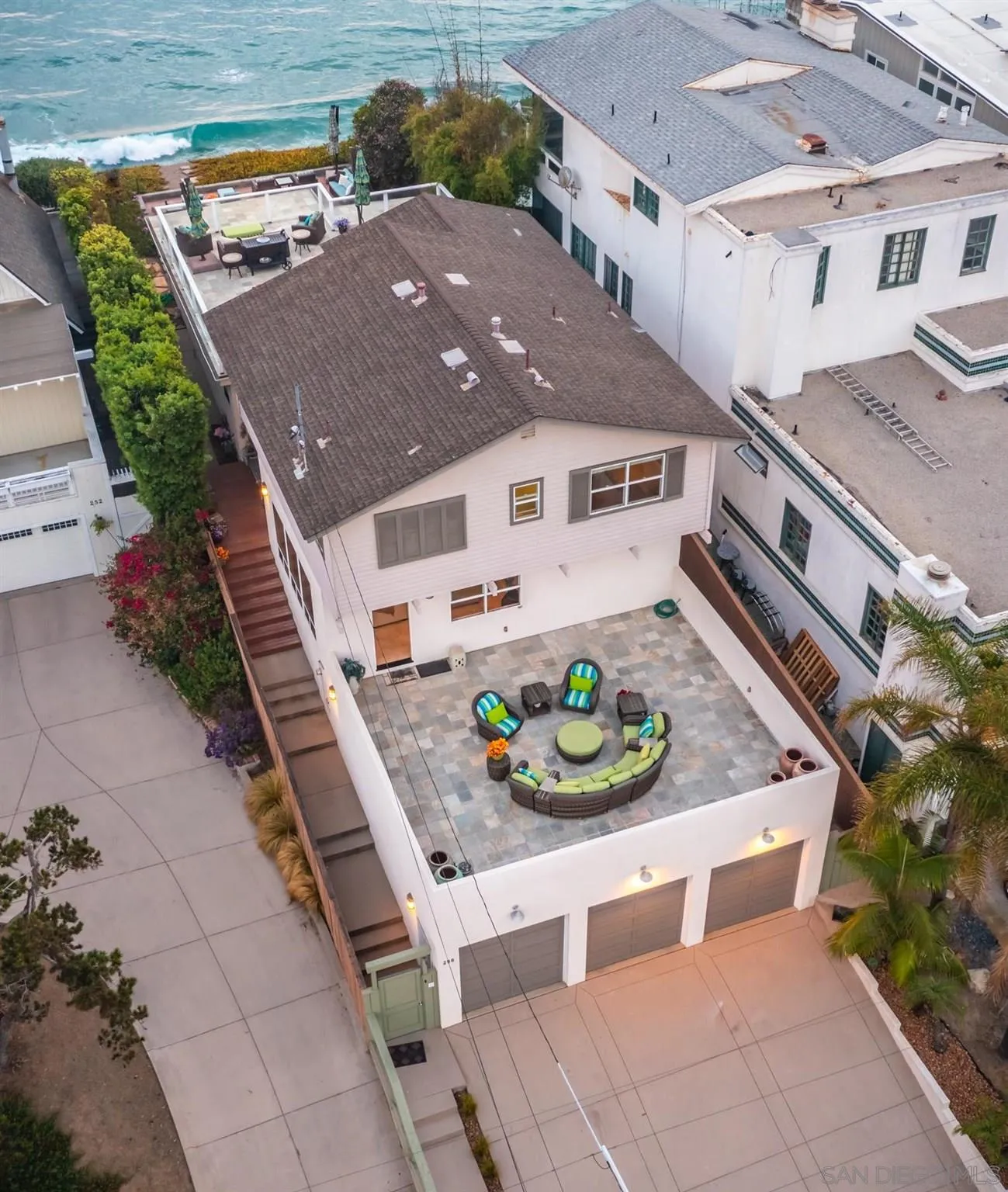 258 Neptune Avenue Encinitas, CA 92024 - Photo 2 of 26 an aerial view of a house with a yard and potted plants