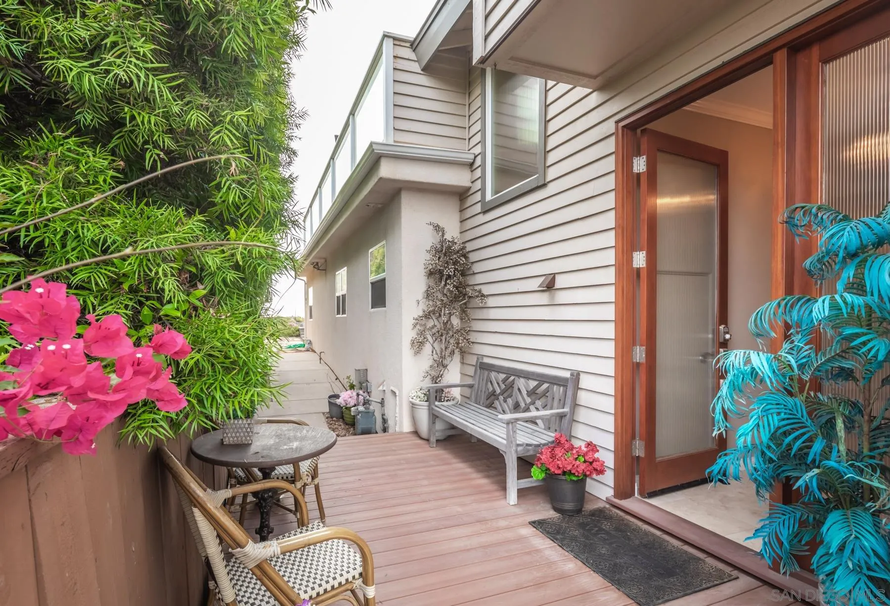 258 Neptune Avenue Encinitas, CA 92024 - Photo 5 of 26 a view of a porch with furniture