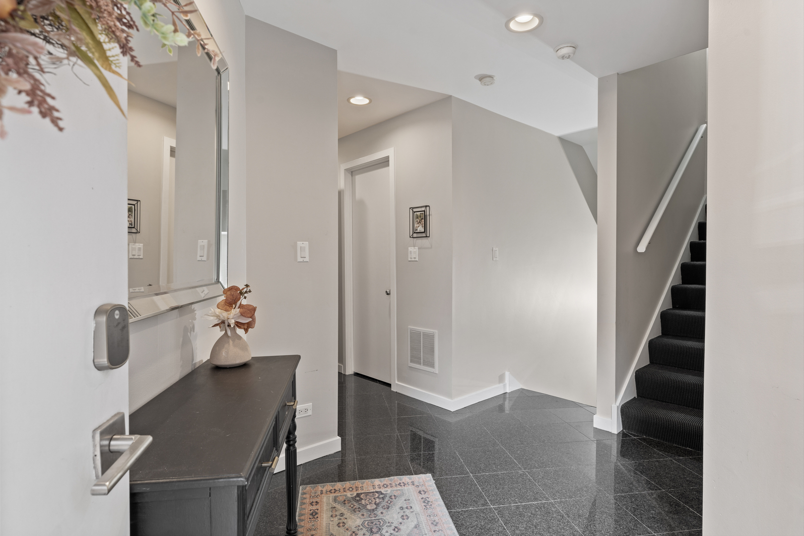 2828 North Talman Avenue, Unit R Chicago, IL 60618 - Photo 17 of 31 a bathroom with a sink and mirror