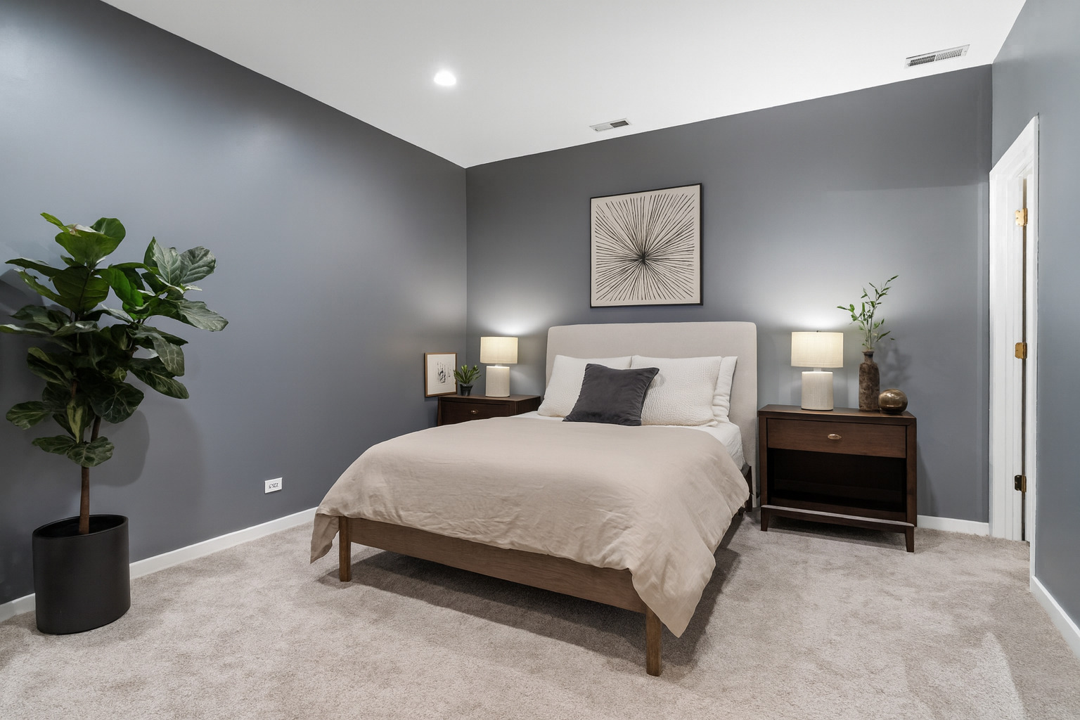 2828 North Talman Avenue, Unit R Chicago, IL 60618 - Photo 18 of 31 a bedroom with a bed and a potted plant