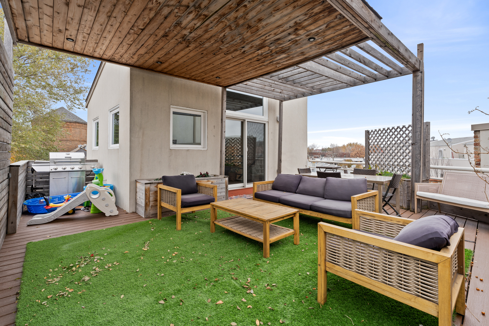 2828 North Talman Avenue, Unit R Chicago, IL 60618 - Photo 26 of 31 a outdoor living space with furniture and a garden