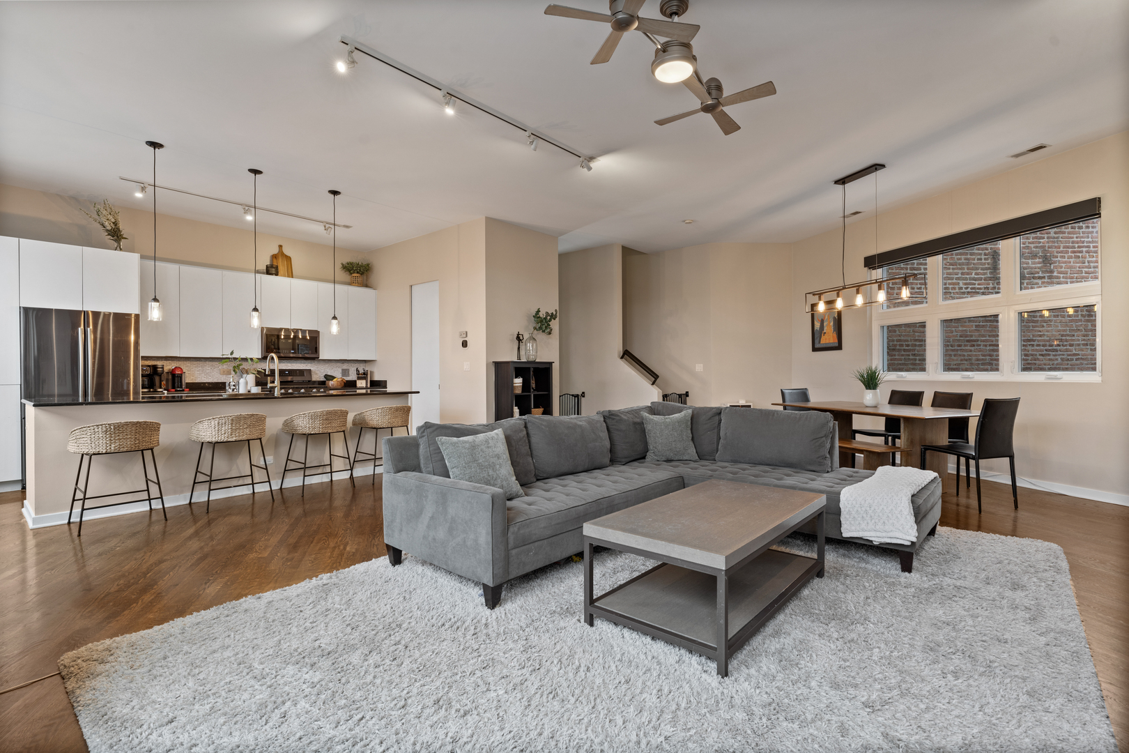 2828 North Talman Avenue, Unit R Chicago, IL 60618 - Photo 5 of 31 a living room with furniture and kitchen view